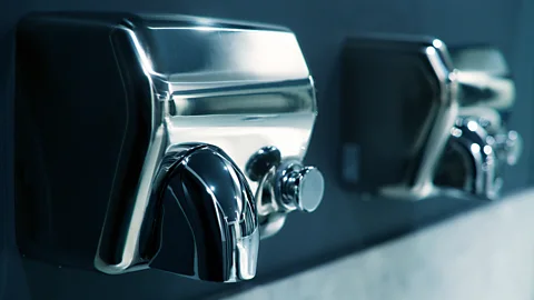 iStock Older hand dryers took a long time to dry - but modern jet dryers are much faster (Credit: iStock)
