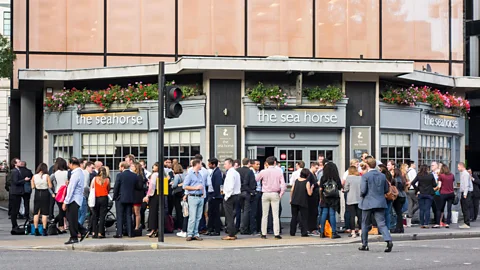 Alamy Oddly enough, being able to drink with colleagues every night of the week makes for more superficial relationships (Credit: Alamy)