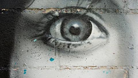 iStock Some research has indicated that eyes painted on a wall can persuade people to moderate their behaviour, but this has not been confirmed by subsequent studies (Credit: iStock)