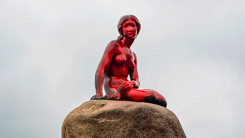 AP Anti-whaling activists splashed red paint on Edvard Eriksen’s statue of The Little Mermaid (Credit: AP)