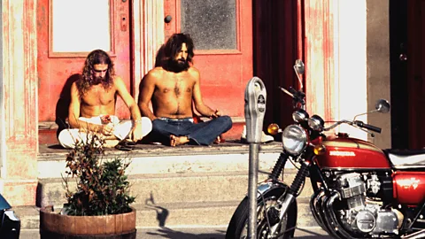 Alamy Hippies sit in a doorway in the Haight-Ashbury district of San Francisco – an area associated strongly the counterculture in 1969 when the picture was taken (Credit: Alamy)
