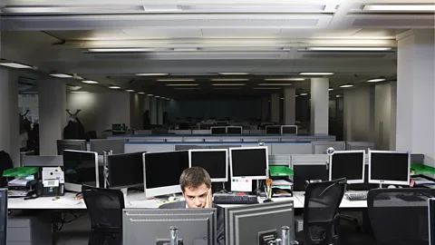 Getty Images The fluorescent strip lighting often used in open plan offices can feel dingy and harsh (Credit: Getty Images)