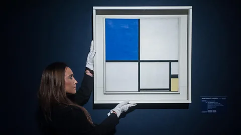 Alamy Mondrian is best known for his stark squares and rectangles separated by bold black lines and sometimes painted in primary colours (Credit: Alamy)