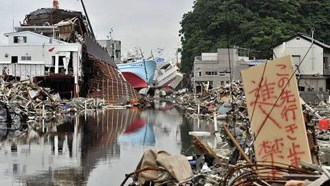 Getty Images During the 2011 earthquake in Japan, people ran to save bottles of alcohol from smashing in supermarkets while their lives were in danger (Credit: Getty Images)