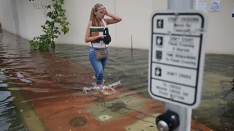 Getty Images Floods and rising sea levels are becoming more common in coastal regions like Florida as populations grapple with the effects of climate change (Credit: Getty Images)