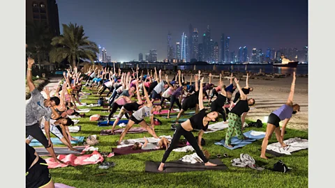 Nick Hannes Full Moon Yoga at Fairmont The Palm Hotel, on the world’s largest man-made island, shaped in the form of a palm tree, 17 September 2016 (Credit: Nick Hannes)
