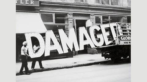 Walker Evans Archive, The Metropolitan Museum of Art Photos such as Truck and Sign, 1930 with its huge ‘Damaged’ sign can be understood as a metaphor for US society (Credit: Walker Evans Archive, The Metropolitan Museum of Art)