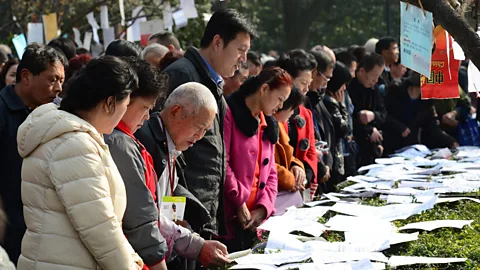 Alamy Parents gather at a matchmaking corner in Xi’an to scout for potential partners for their children (Credit Alamy)
