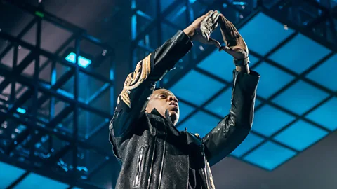 Alamy Jay Z is one famous hip hop star to raise their hands into the alleged Illuminati triangle symbol at concerts (Credit: Alamy)