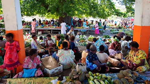 Whitworth Images/Getty Images Upon trying to communicate at the Lenakel Market, the author discovered Bislama was not an easy language to understand (Credit: Whitworth Images/Getty Images)