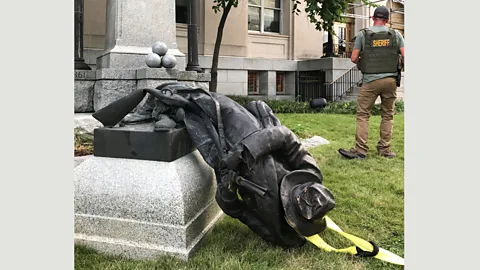 Reuters/ Kate Medley A statue of a Confederate soldier in front of the old Durham County Courthouse in Durham, North Carolina was toppled by protestors this week (Credit: Reuters/ Kate Medley)