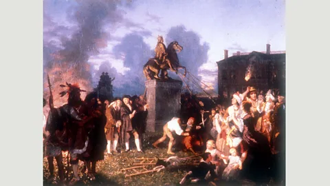 Wikimedia Pulling Down the Statue of King George III, NYC (1859), was a romanticised depiction of an event in 1776 by Johannes Adam Simon Oertel (Credit: Wikimedia)