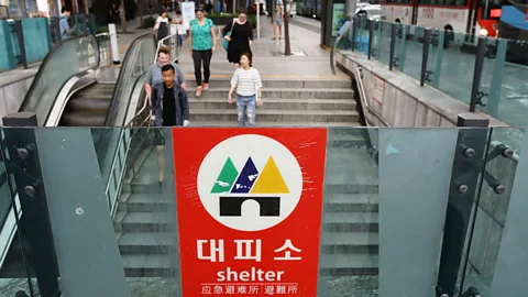 Chung Sung-Jun/Getty Images A 'shelter' sign at the entrance to a subway station in Seoul, South Korea (Credit: Chung Sung-Jun/Getty Images)