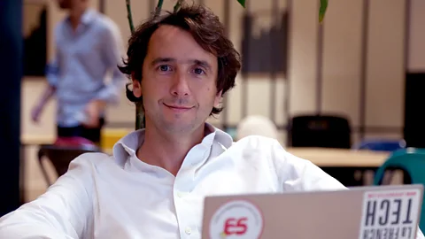 GuestToGuest Instead of infuriating his fellow commuters by taking phone calls on the train, GuestToGuest's Emmanuel Arnaud talks as he rides his bike to work (Credit: GuestToGuest)