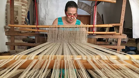 Eliot Stein The loom Chiara Vigo weaves on has been in her family for more than 200 years (Credit: Eliot Stein)