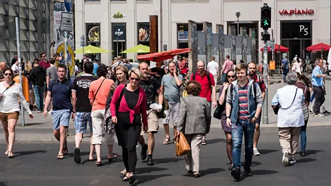 Berlin-Zeitgeist/Alamy Germans are fond of following rules, such as always waiting for the walk sign to cross the street (Credit: Berlin-Zeitgeist/Alamy)