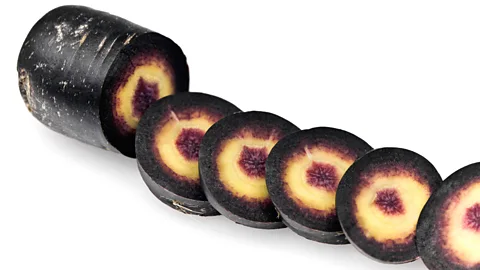 Alamy Purple-coloured carrots can crop up in the most unlikely places - such as making yoghurt a berry-like colour (Credit: Alamy)