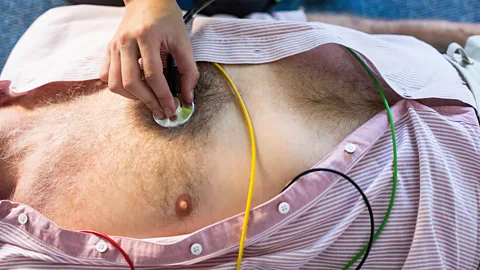 Alamy Men are more likely to have chest pain when they have a heart attack (Credit: Alamy)