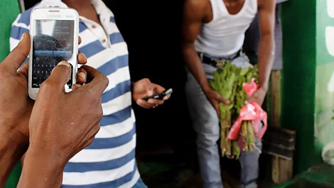 Matthew Vickery In Somaliland, vendors and customers pay each other digitally using simple phone programmes that require no internet access (Credit: Matthew Vickery)