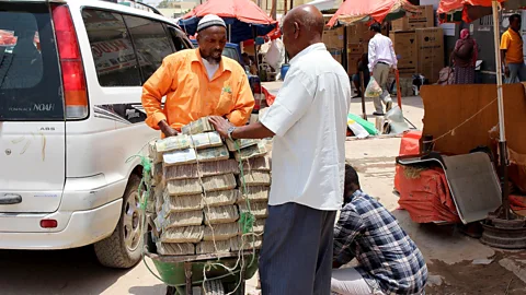 Matthew Vickery In Somaliland, stacks and stacks of the local devalued physical currency are rapidly falling out of fashion - people are turning to digital payments (Credit: Matthew Vickery)