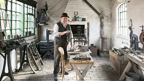Chris Griffiths Man in bowler hat working in workshop (Credit: Chris Griffiths)