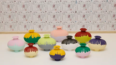 Ai Weiwei Studio The exhibition includes 10 pieces from his series Coloured Vases: Neolithic and Han dynasty (206 BC-220 AD) with urns dipped in garish paint (Credit: Ai Weiwei Studio)