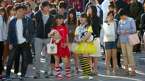 Carl Court/Getty Images The district of Harajuku in Tokyo has always attracted inventive teen subgroups (Credit: Carl Court/Getty Images)