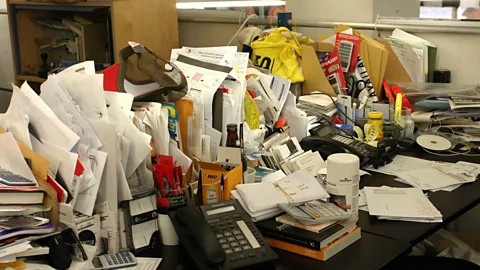 Alamy Can’t see your desk under all the mess? Lavie’s experiments suggest you’re onto something (Credit: Alamy)