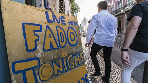 Horacio Villalobos - Corbis/Getty Images Fado is a traditional music and dinner experience for which Portugal is famous (Credit: Horacio Villalobos - Corbis/Getty Images)