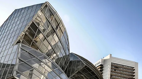 Alamy The Basel headquarters of pharma giant Novartis includes a 32,000 sq m Frank Gehry office building (Credit: Alamy)