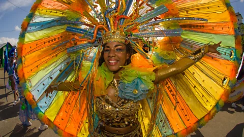 Alamy Carnival in Trinidad still follows the global calendar of Carnival events that take place before Lent, while Notting Hill Carnival takes place in late summer (Credit: Alamy)