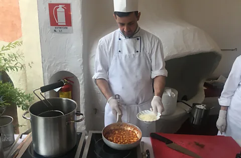 David Farley Malloreddus alla Campidanese is made with a rich ragu made from tomatoes, sausage and saffron (Credit: David Farley)