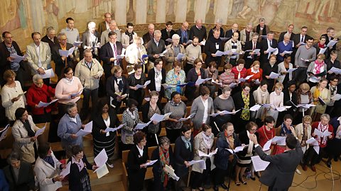 A church choir comprising soprano, alto, tenor and bass singers