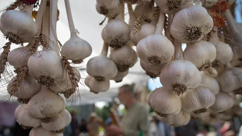 Rick Madonik/Getty Images In Romania, garlic is thought to protect people and homes from evil spirits (Credit: Rick Madonik/Getty Images)