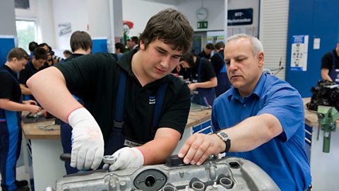 An apprentice being trained