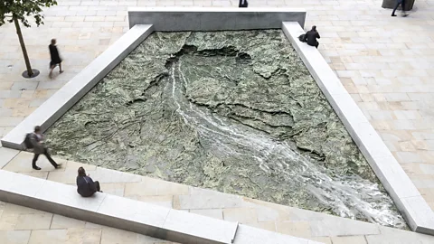 Nigel Young/Foster + Partners Forgotten Streams, a work by Spanish installation artist and sculptor Cristina Iglesias, occupies two of the public plazas around the site (Credit: Nigel Young/Foster + Partners)