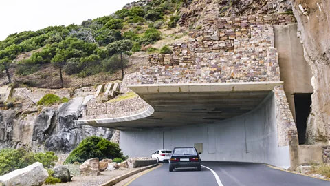 Michelle Dormer/Getty Images A ‘half tunnel’ was designed to protect the road from small rockslides (Credit: Michelle Dormer/Getty Images)