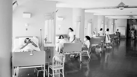 Jack Manning/Three Lions/Getty Images A 1950s image of a hospital ward Caracas, Venezuela shows how privacy started to grow more valued mid-Century (Credit: Jack Manning/Three Lions/Getty Images)
