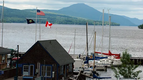 Christian Science Monitor/Getty Images While kayaking on Lake Memphremagog, the author crossed the US border into Canada (Credit: Christian Science Monitor/Getty Images)
