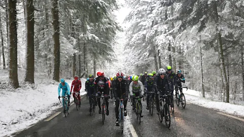 Getty Images Firms can set challenges for their workers: reaching a certain number of steps over a month, or pitch teams against each other in events such as cycling (Credit: Getty Images)