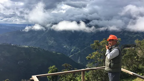 Eliot Stein Sánchez uses a two-way radio to report signs of an impending eruption (Credit: Eliot Stein)