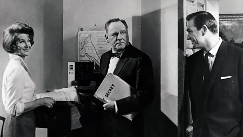 Alamy M, is the unquestioned object of Bond’s admiration, a shrewd father figure with a background in the navy. He is hard to please – and refuses sentimentality.(Credit: Alamy)