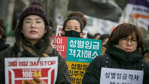 Getty Images South Korean women protest against gender inequality and sexual harassment in the workplace in Seoul (Credit: Getty Images)