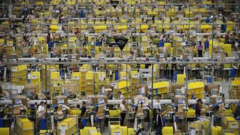 Getty Images Amazon workers preparing orders for dispatch ahead of Black Friday sales (Credit: Getty Images)