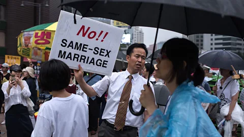 Getty Images An anti gay rights campaigner in Seoul, South Korea (Credit: Getty Images)