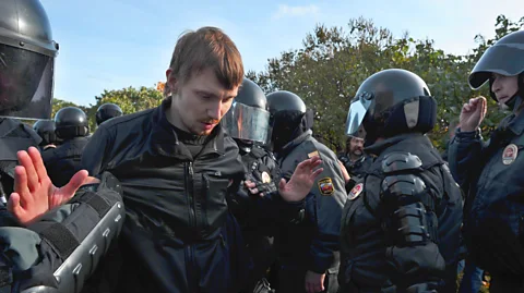 Getty Images Russian police detaining a gay rights activist at a gay pride event in Saint Petersburg (Credit: Getty Images)