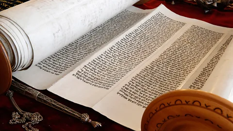 Godong/Getty Images Bible scholar Christian David Ginsburg believed Shapira had forged the manuscript using pieces of an old Torah scroll (Credit: Godong/Getty Images)