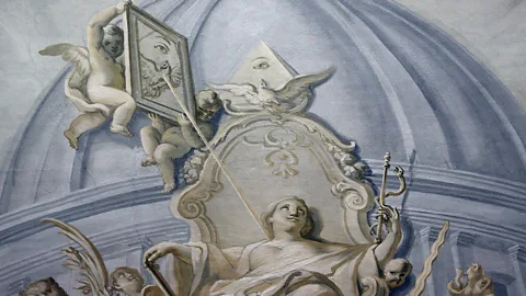 Julie Ovgaard The Eye of Providence, pictured here on the ceiling of Ingolstadt’s Maria de Victoria church, is often associated with the Illuminati (Credit: Julie Ovgaard)