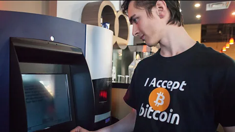 Getty Images The world's first bitcoin ATM or cashpoint in Vancouver, British Columbia, in 2013. It allows users to buy or sell the digital currency (Credit: Getty Images)