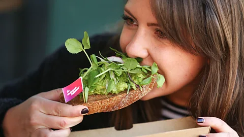 Getty Images A millennial, apparently one slice of avocado toast further away from home ownership (Credit: Getty Images)